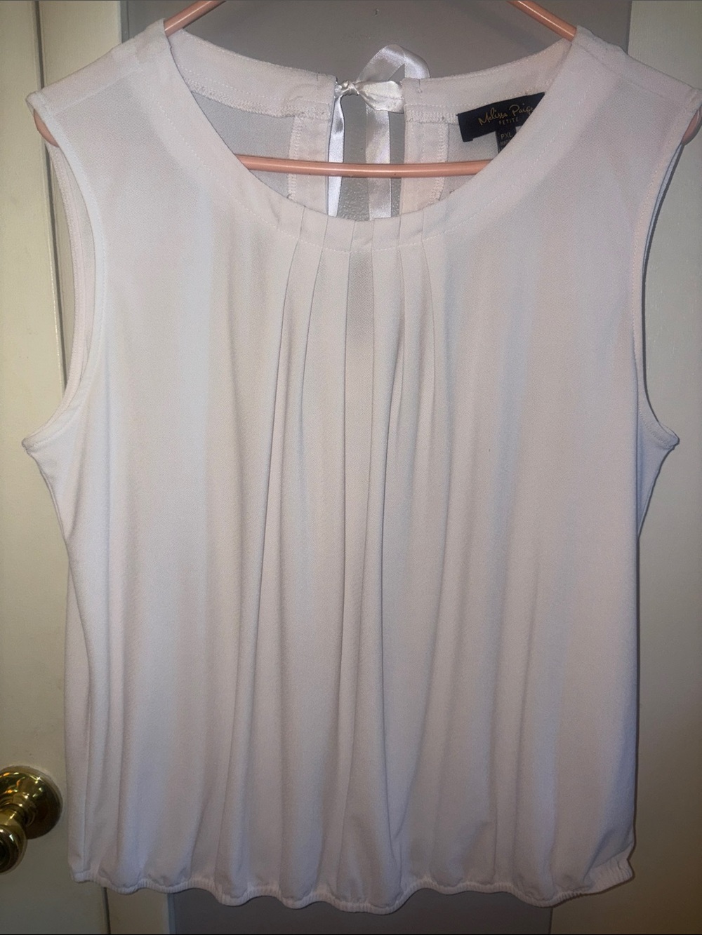 Melissa Paige Ivory Sleeveless Pleated Blouse